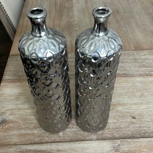 Two metallic vases